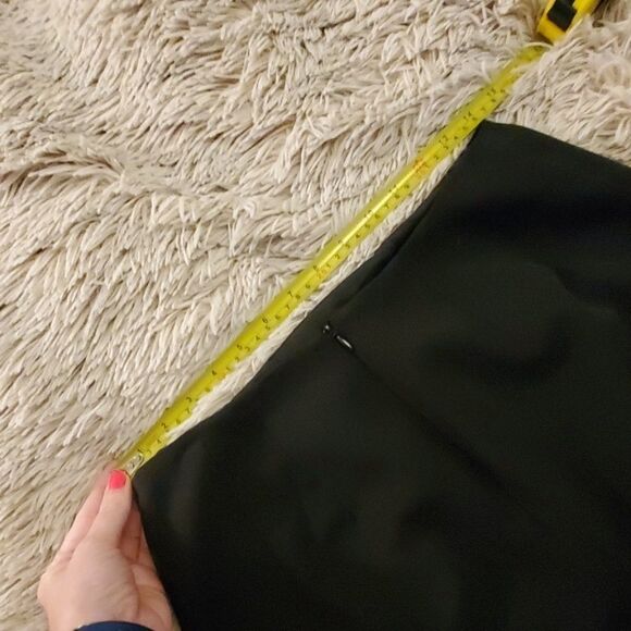 Fun black pencil skirt with feather lined bottom - Picture 6 of 7
